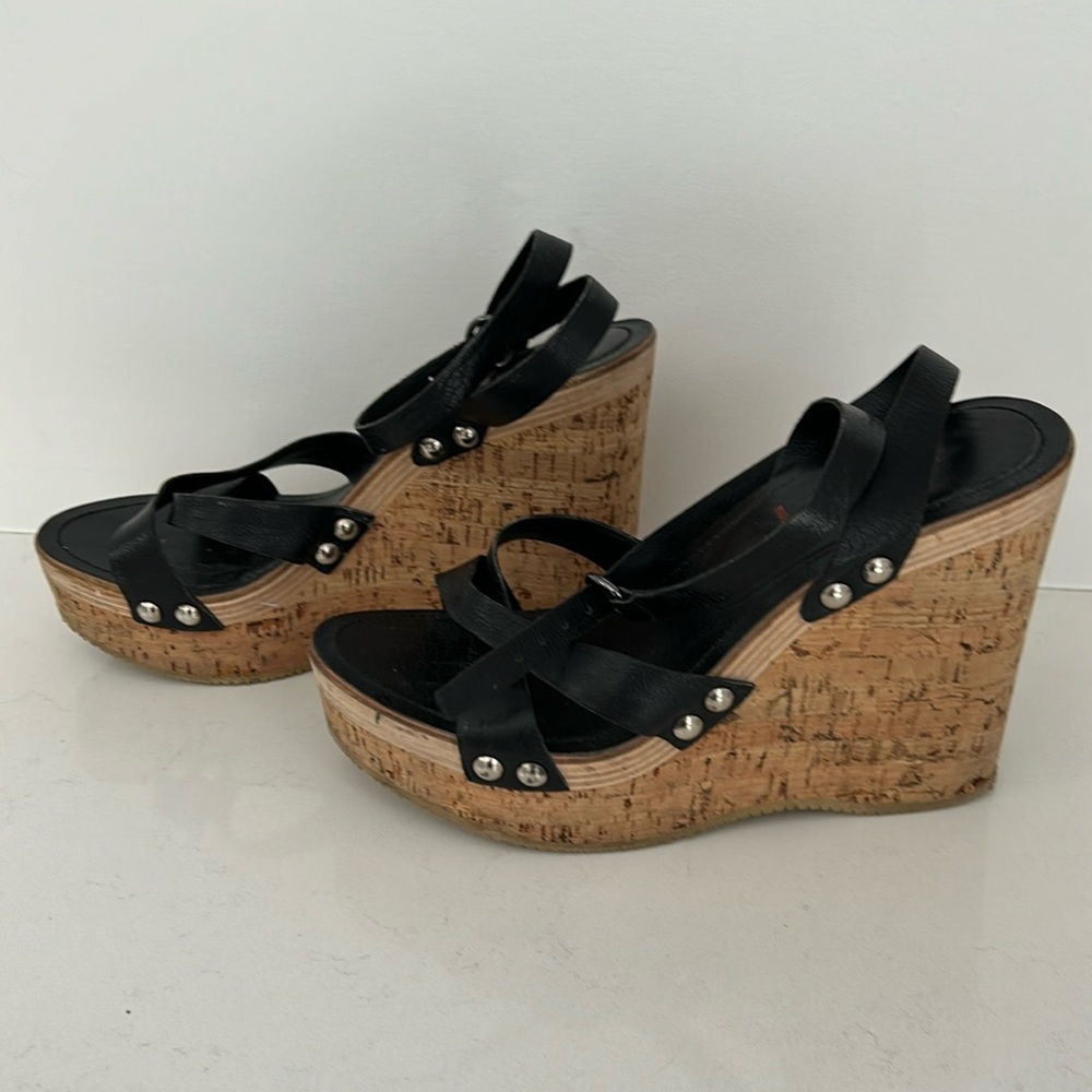 Miu Miu black leather and cork sandals.